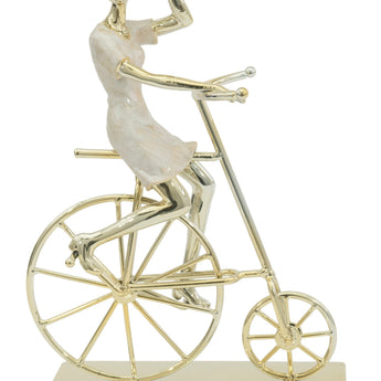 Elegante Escultura Dorada Mujer en Bicicleta Decorativa para Mesa Moderna